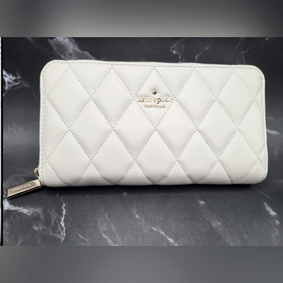 kate spade Handbags - NWT Kate Spade White Quilted Large Wallet